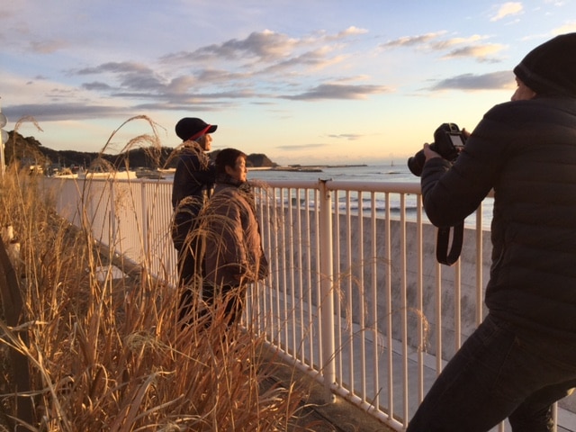 Dateline reporter Amos Roberts films couple Shikego and Takemasa Watanabe, as they watch the sun rise. Dateline reporter Amos Roberts films couple Shikego and Takemasa Watanabe, as they watch the sun rise.