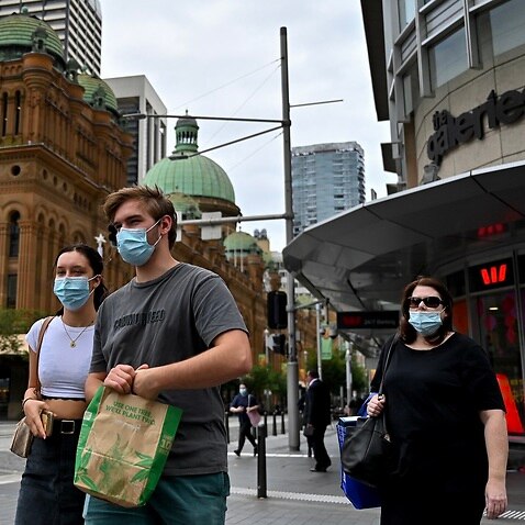 People wear masks while shopping in Sydney's CBD.
