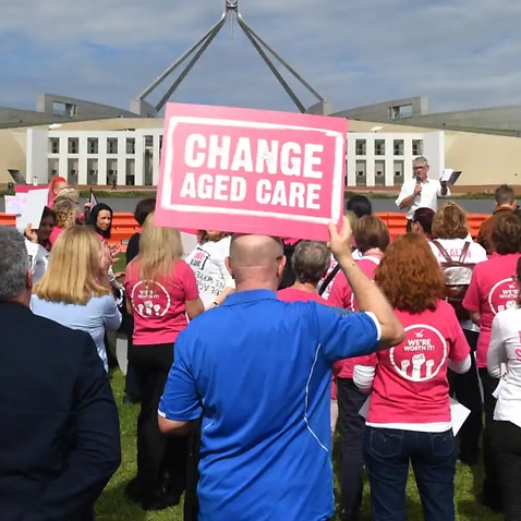 Aged care workers protesting outside Parliament House in Canberra