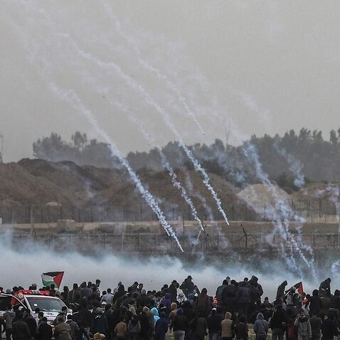 Tear gas is fired at Palestinian protesters