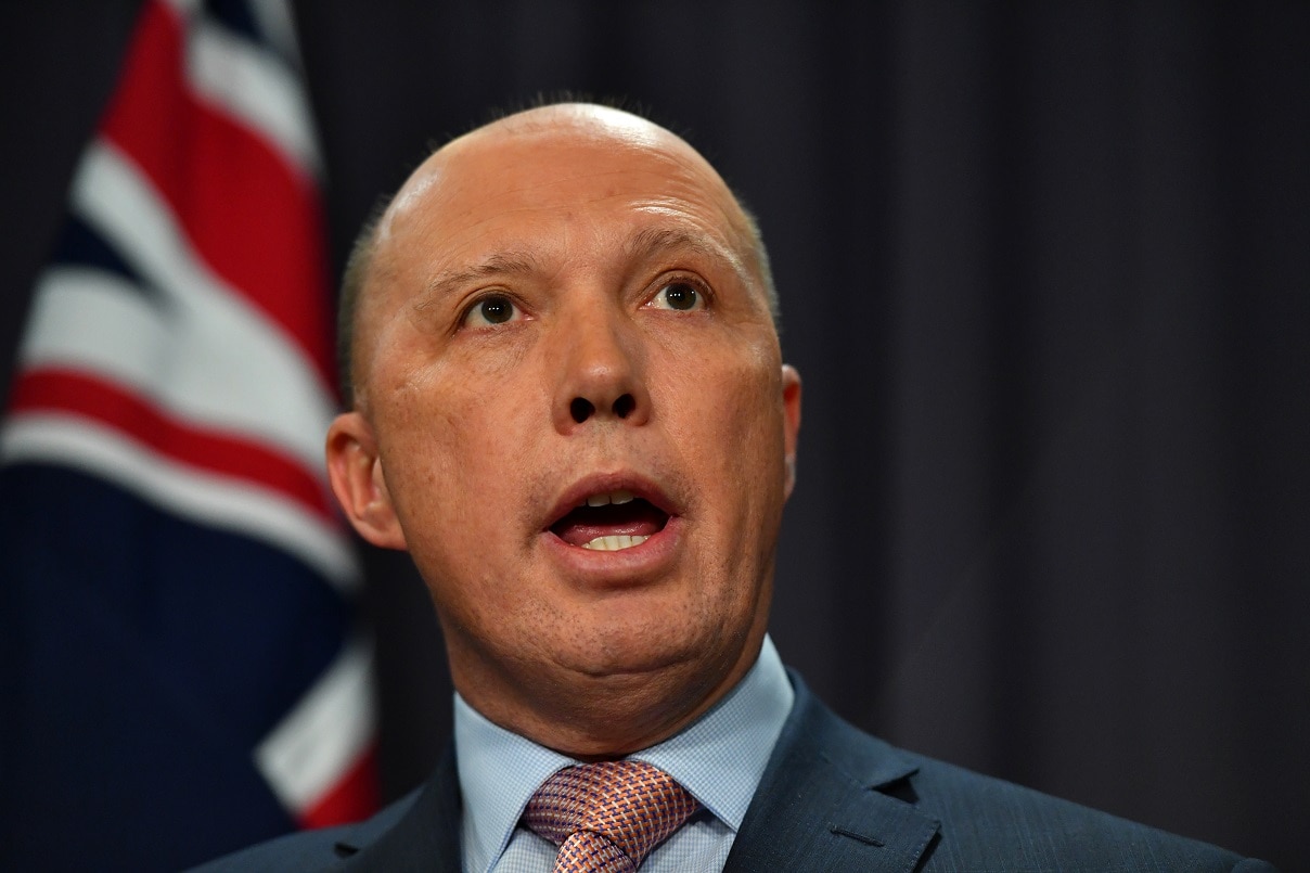 Minister for Home Affairs Peter Dutton addresses the media.