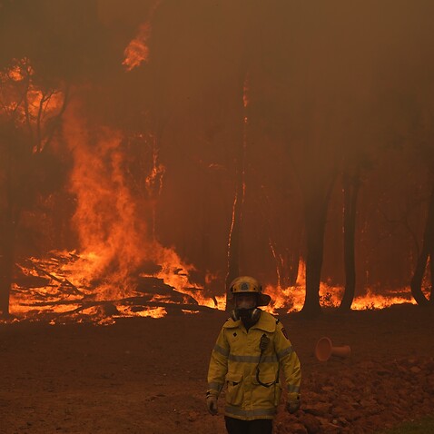 A supplied image of DFES fire fighters battling a blaze in Brigadoon, Perth, Tuesday, 2 February, 2021. 