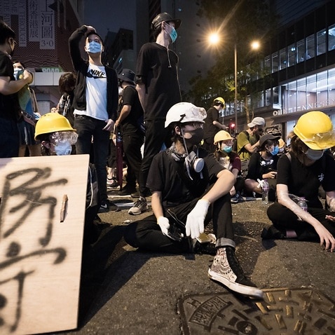 Protesters with the home made protective gears seen outside the police headquarters of Hong Kong. 