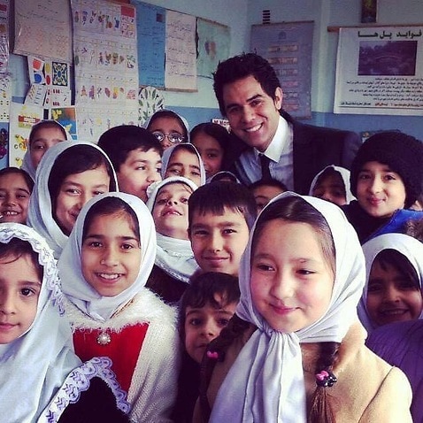 Omid Nezami with Afghan school children before the ban on girls attending high school
