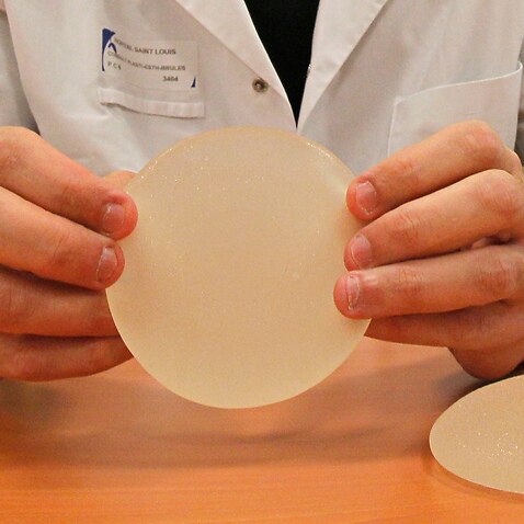 A textured silicone gel breast implant