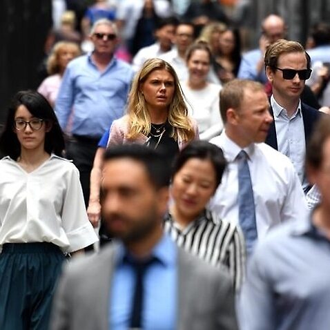Office workers are seen at lunch break at Martin Place in Sydney