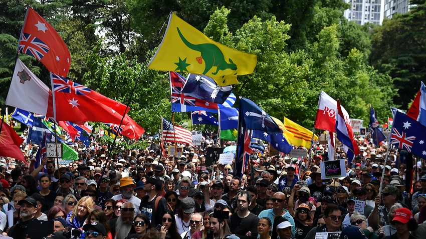 People participate in the 'freedom rally' protest in Melbourne, Saturday, December 4, 2021.