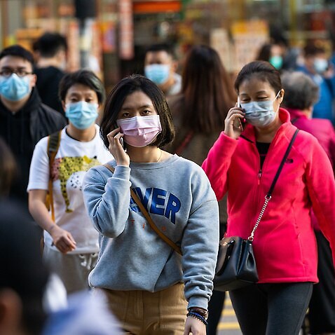 Residents wearing masks to prevent the spread of the novel coronavirus