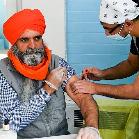 Vaccine is administered at the Guru Nanak Gurdwara Sikh temple in Luton, UK 