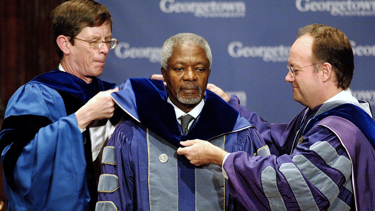 Kofi Annan receives a sash as he is conferred the Doctor of Humane Letters degree from Georgetown University.