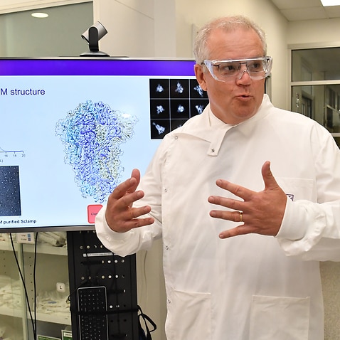 Prime Minister Scott Morrison is seen during a tour of the University of Queensland Vaccine Lab in Brisbane, Monday, October 12, 2020. 