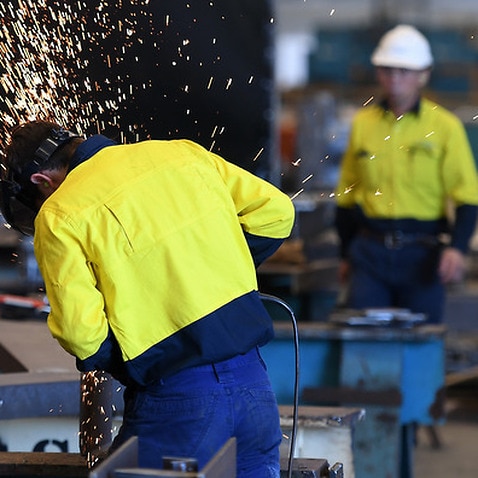 Workers are seen on the production floor at the Civmec Construction and Engineering facility in Perth, Friday, March 10, 2017. (AAP Image/Dan Peled) NO ARCHIVING