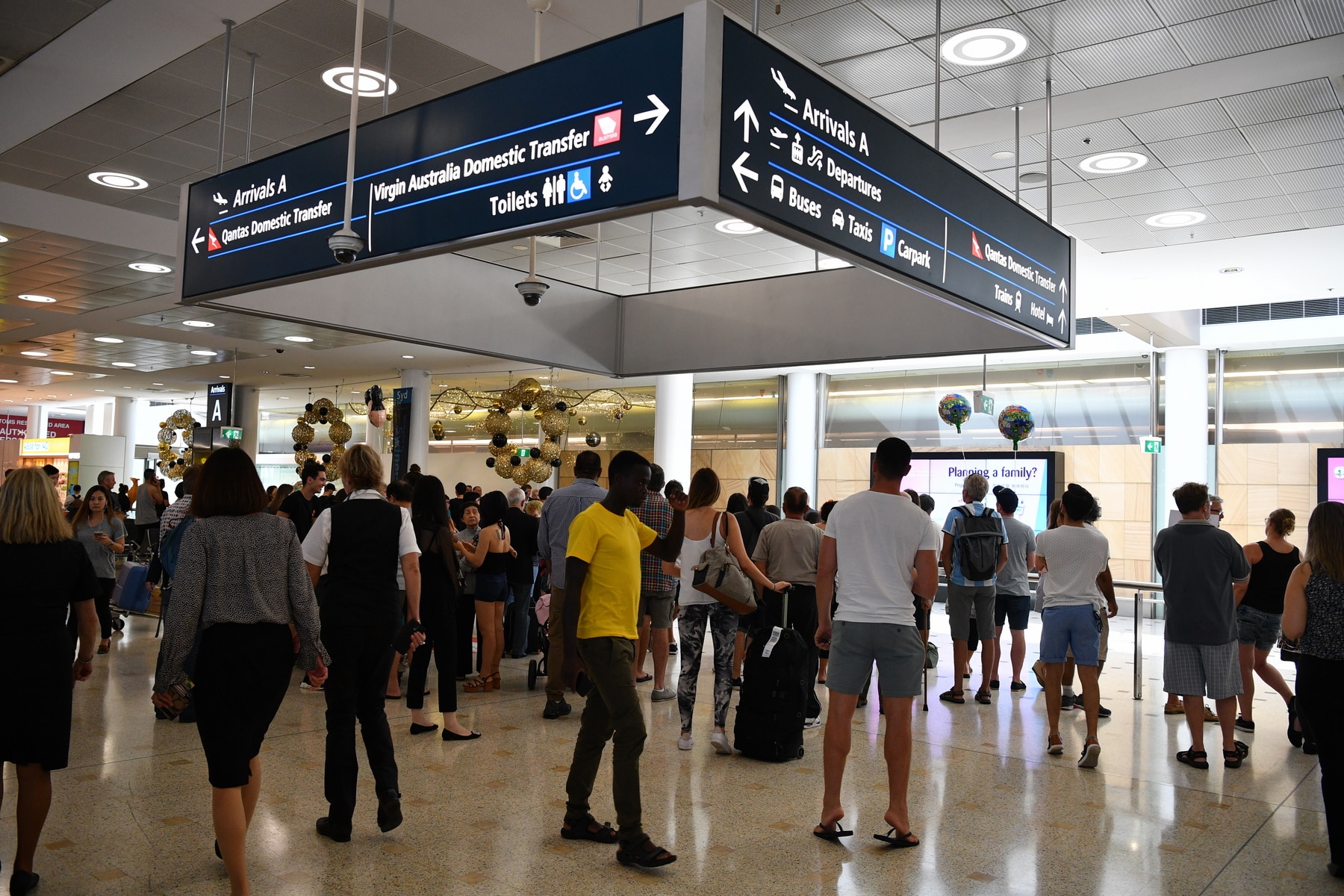 Travelers arriving at Sydney International Airport