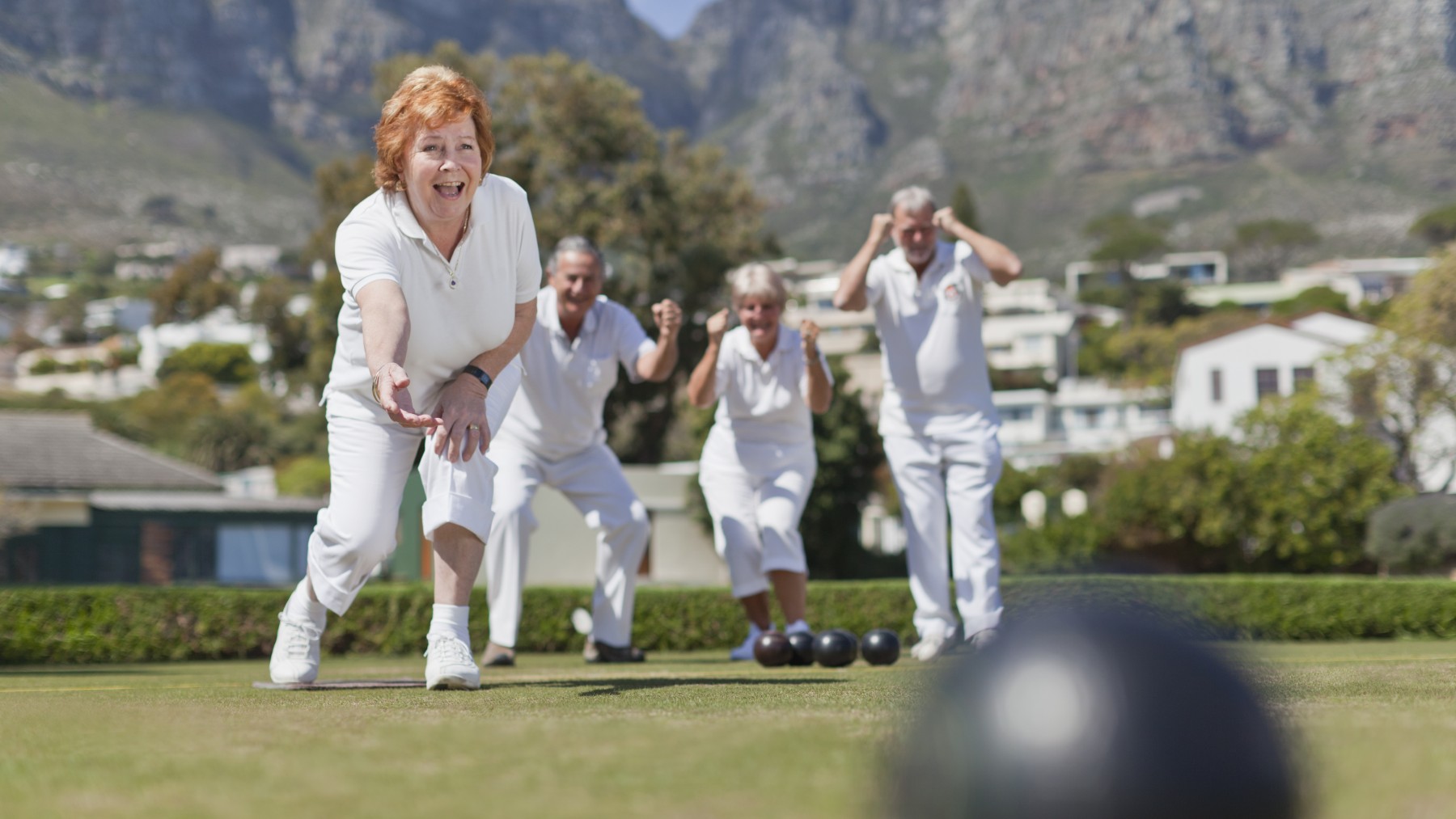Retirees playing bowls 