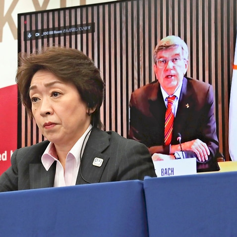 Tokyo Games organizing committee President Seiko Hashimoto (front) attends a five-party meeting with International Olympic Committee President Thomas Bach and others in Tokyo on March 3, 2021. 
