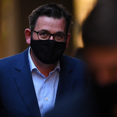 Victorian Premier Daniel Andrews arrives to a press conference in Melbourne, Friday, August 21, 2020. Victoria has recorded 179 new cases of coronavirus and nine deaths in the past 24 hours. (AAP Image/James Ross) NO ARCHIVING