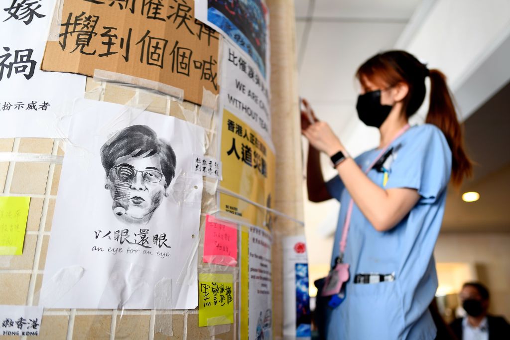 A Badiucao posters is displayed in Hong Kong.