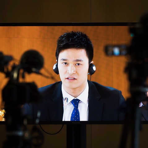Chinese swimmer Sun Yang, is pictured on a TV screen during a public hearing at the Court of Arbitration for Sport, (CAS), in Montreux, Switzerland.
