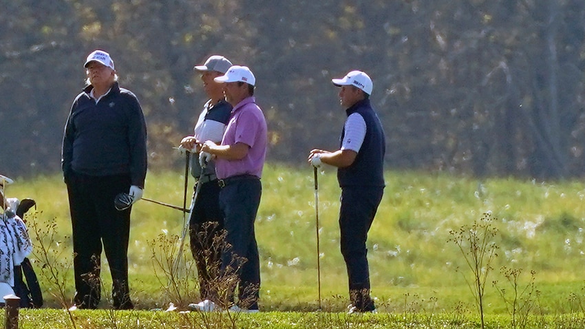 US President Donald Trump (left) was golfing when Joe Biden's victory was declared.
