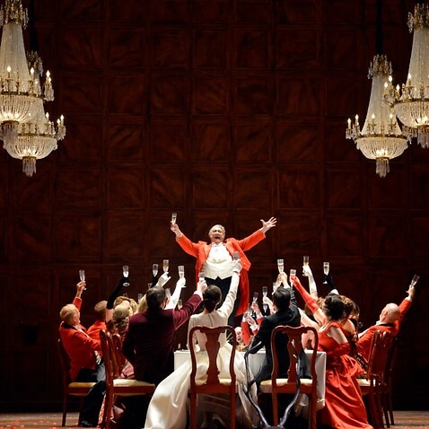 Ambrogio Maestri as Sir John Falstaff with artists of the company in the Royal Opera's production of Giuseppe Verdi's Falstaff directed by Robert Carsen and conducted by Michael Schonwandt at the Royal Opera House Covent Garden in London   