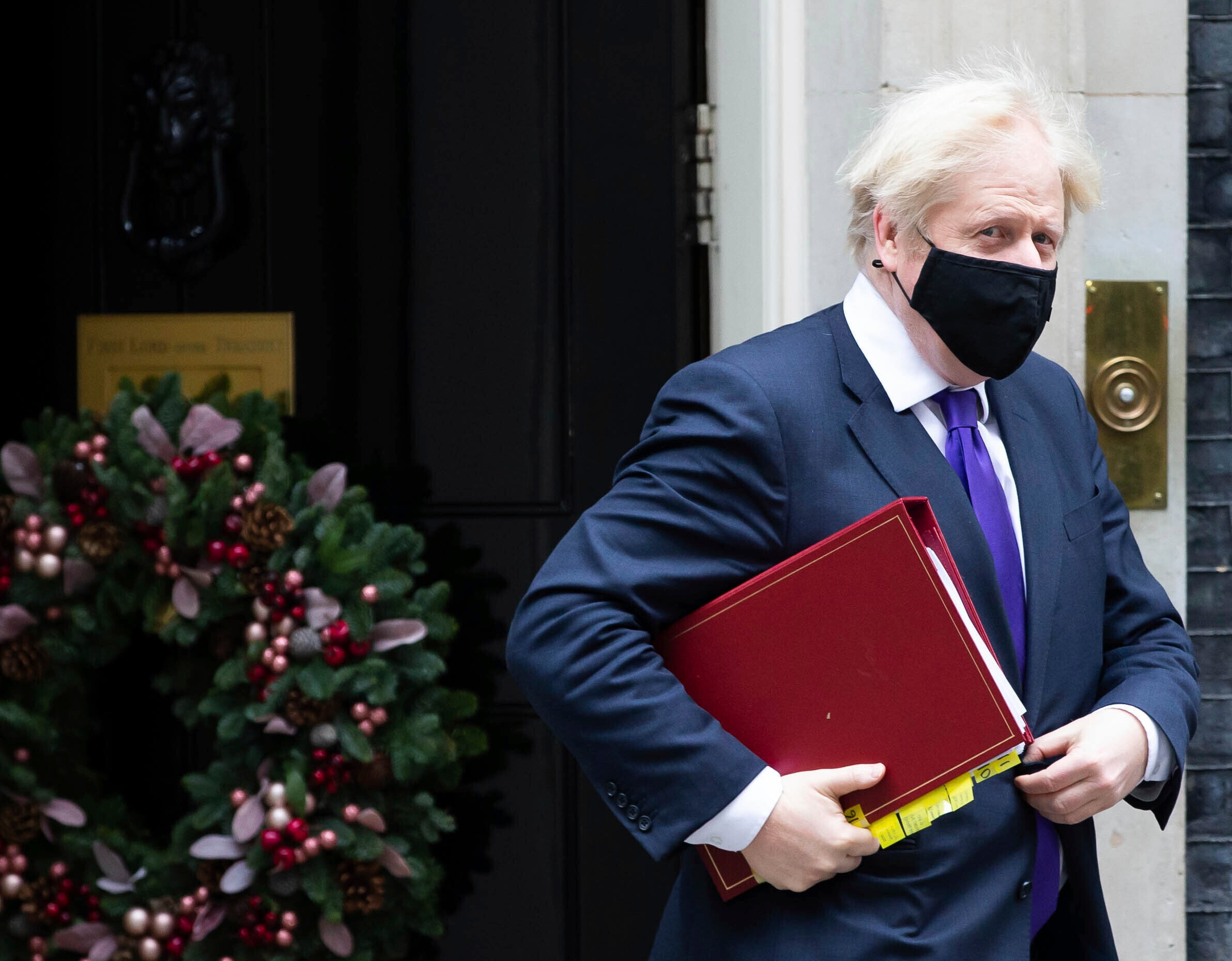 Prime Minister Boris Johnson leaves 10 Downing Street for Parliament.