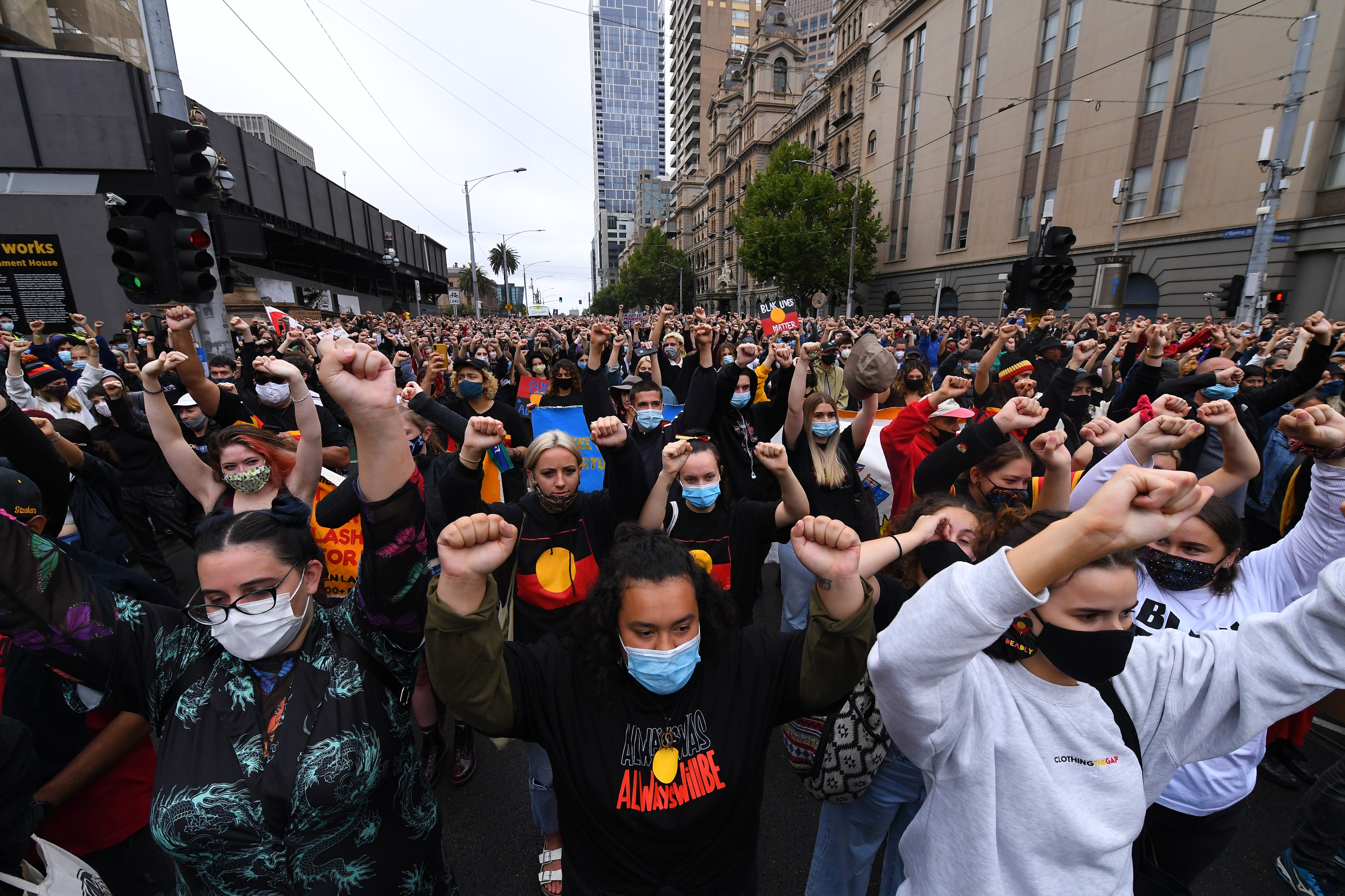 Protesters marched through Melbourne on Tuesday as part of Invasion Day protests.