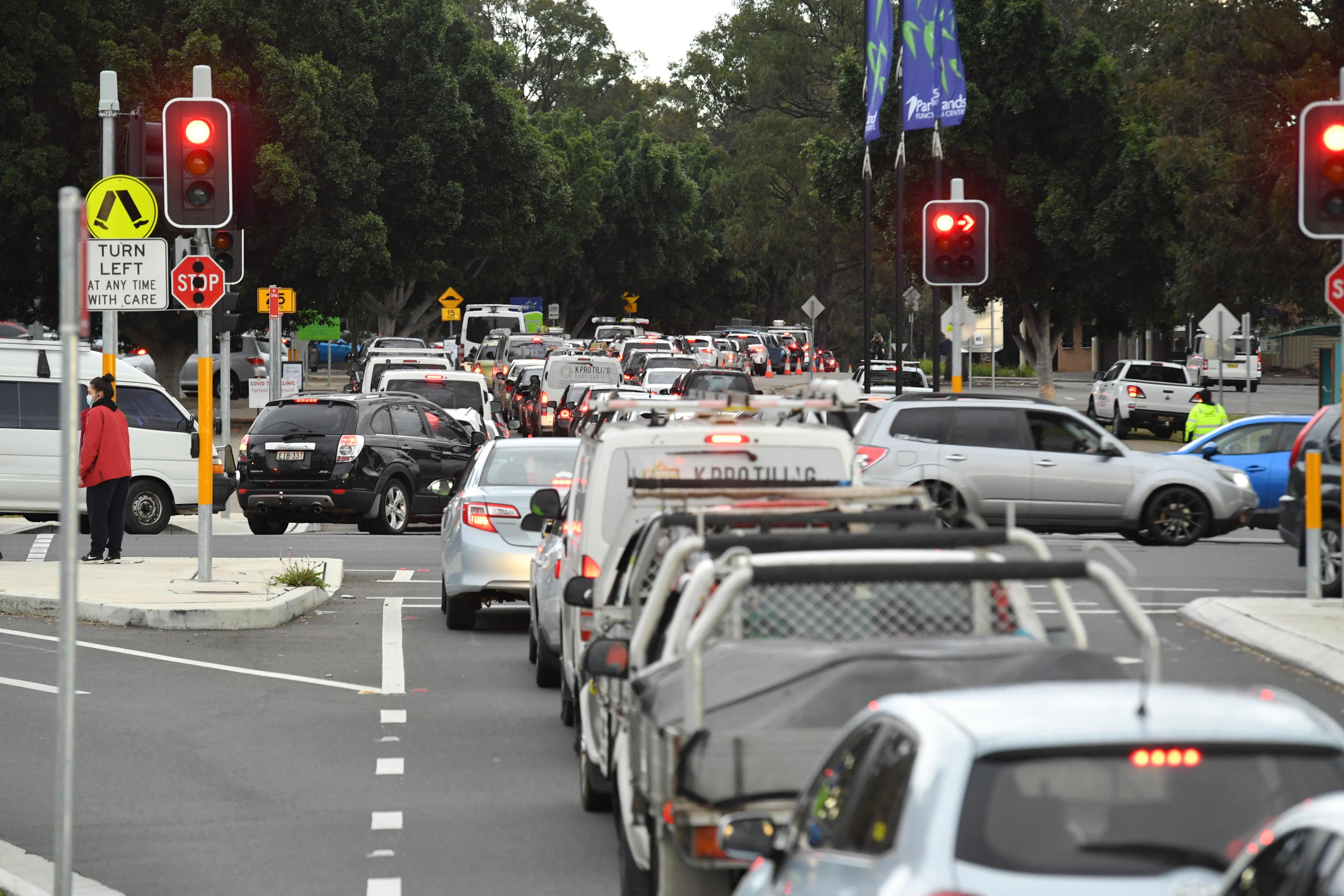 Long queues of cars are seen at a popup COVID testing clinic at the Fairfield Showgrounds in Sydney, Wednesday, July 14, 2021.