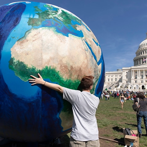 An inflatable globe seen at the West Front of the US Capitol following the climate strike march in Washington, DC, USA, 20 September 2019.