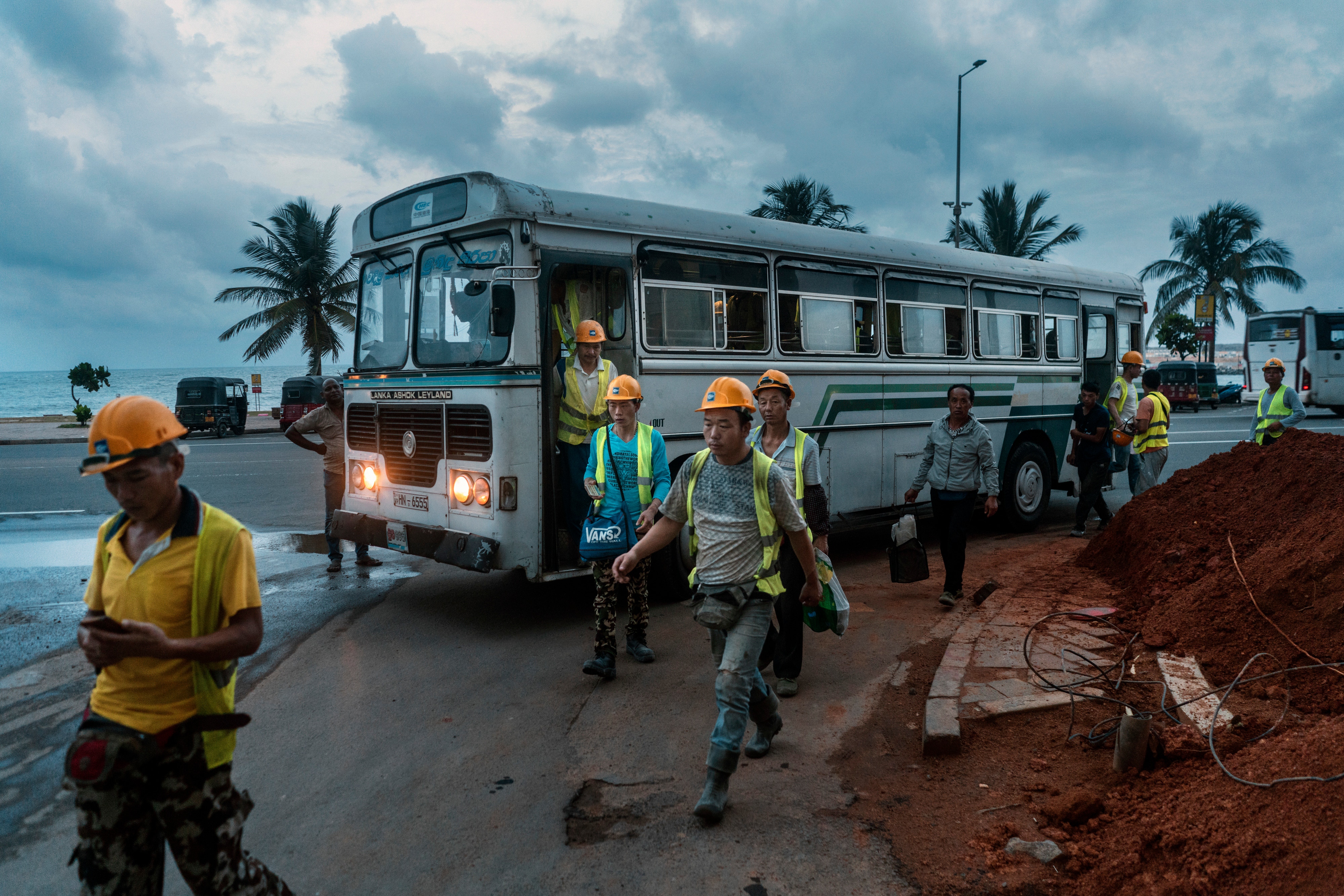 China Harbor employees head to work in Colombo, Sri Lanka, June 3, 2018. 