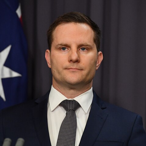 Minister for Immigration Alex Hawke at a press conference at Parliament House in Canberra.