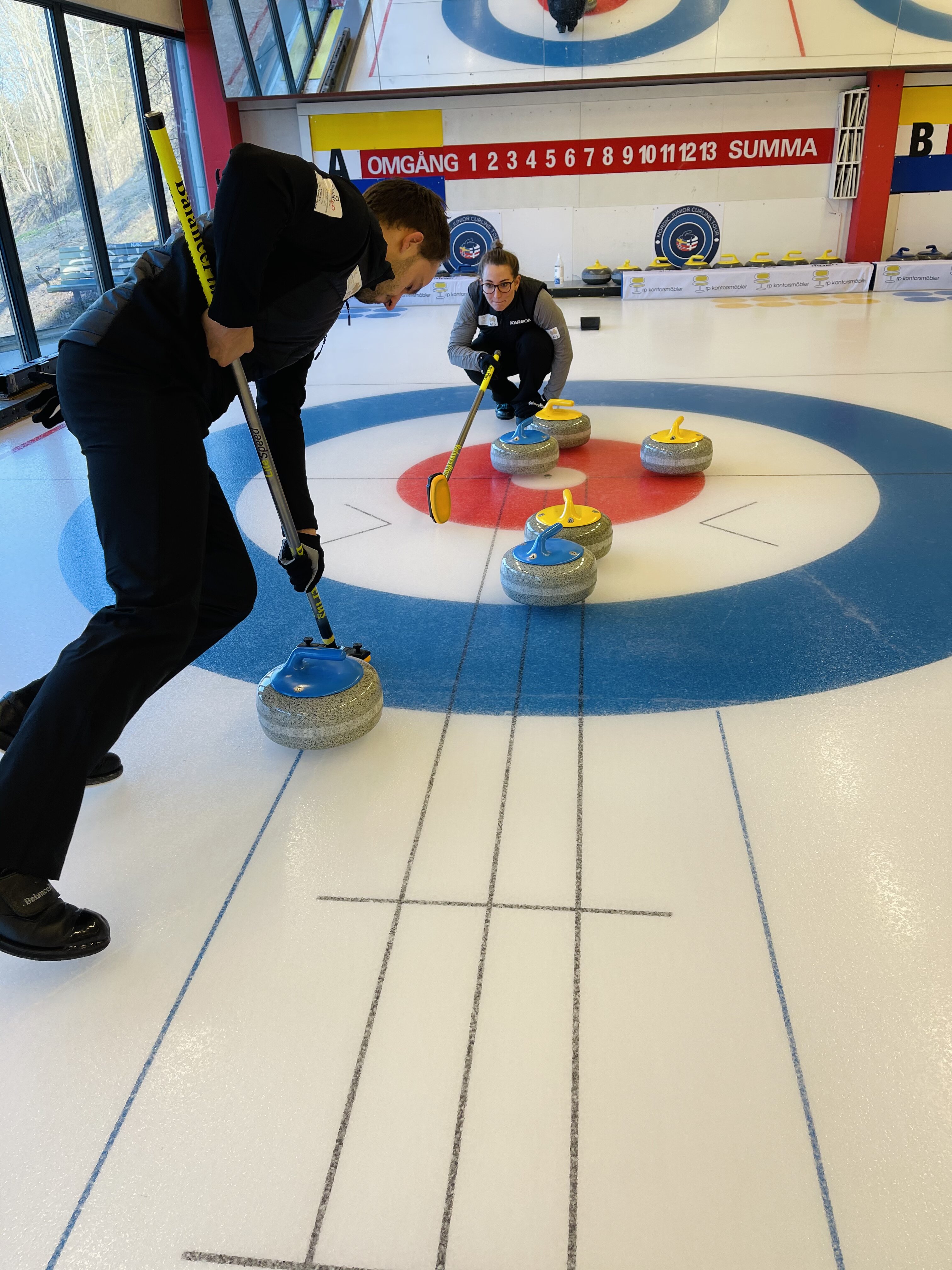 Dean and Tahli training on curling ice