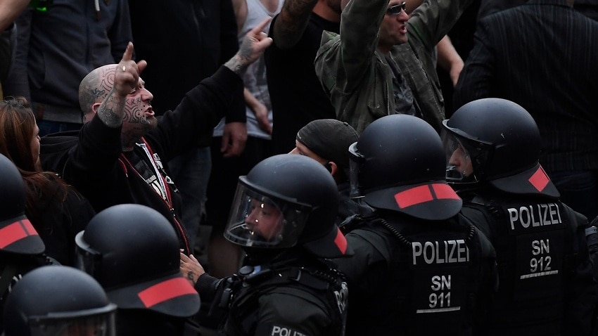 Image for read more article 'German police probe banned Nazi salutes at Chemnitz protests'
