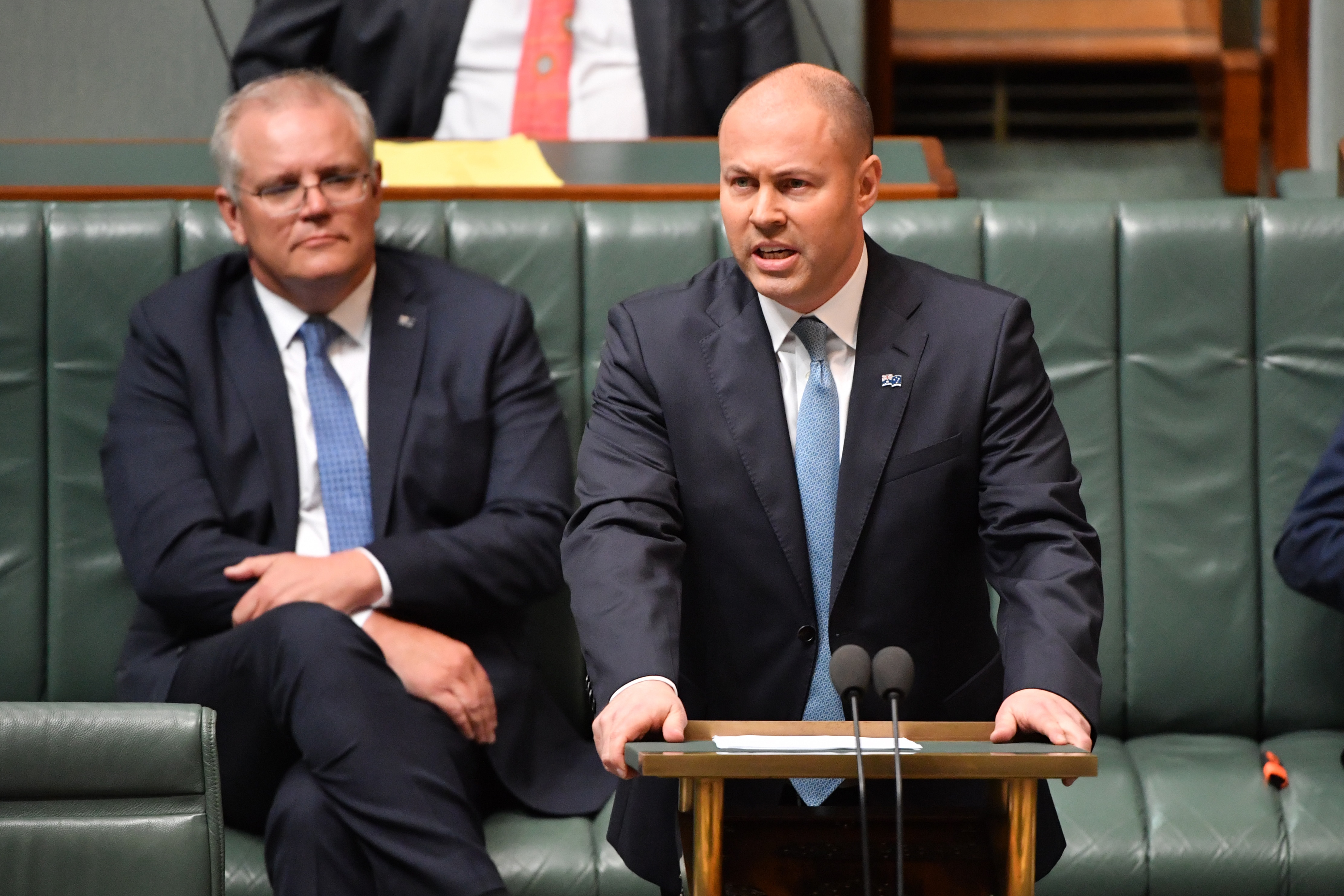 Treasurer Josh Frydenberg hands down the budget at Parliament House.