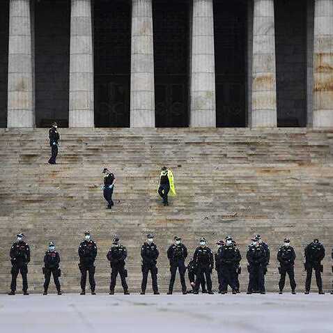 Police are seen at the Shrine of Remembrance before a planned anti-lockdown protest in Melbourne, Saturday 12 September. 