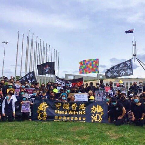 Australia-Hong Kong Link's members and supporters at Parliament House in Canberra.