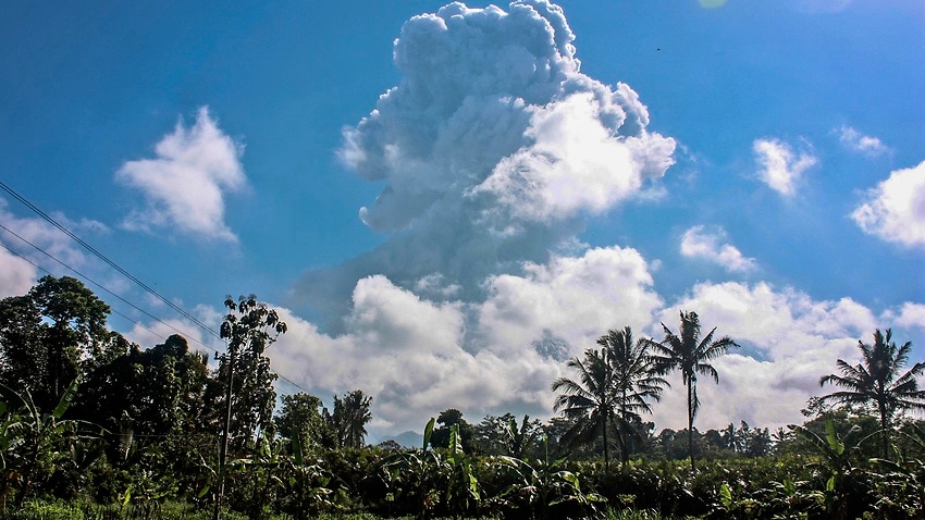 Mount Merapi spews volcanic materials during an eruption as seen from Sleman, Indonesia, 21 June 2020.
