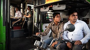 Electric rickshaw drivers wait for traffic to clear outside a Delhi Metro station in New Delhi, India, June 19, 2019. (Saumya Khandelwal/The New York Times)