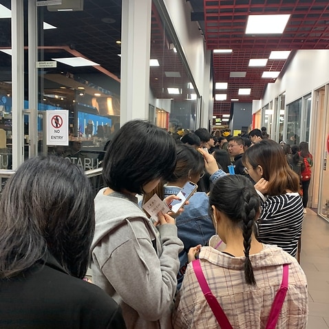 Chinese students outside China Town Cinema