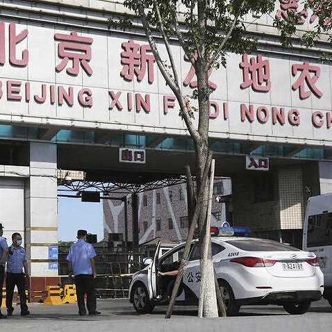The Xinfadi wholesale market, where some market staff tested positive for the new coronavirus, is closed in Beijing on June 15, 2020. The virus was also found on an imported salmon at fish market, which has been also closed. Several major supermarkets in 