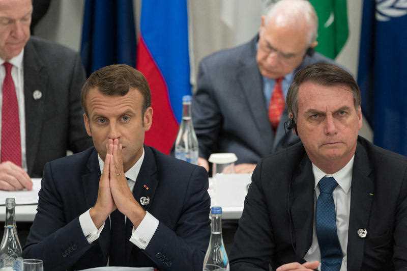 Emmanuel Macron and Jair Bolsonaro during a meeting on world economy at the first day of the G20 Summit in Osaka, Japan in June. Emmanuel Macron and Jair Bolsonaro during a meeting on world economy at the first day of the G20 Summit in Osaka, Japan in June.