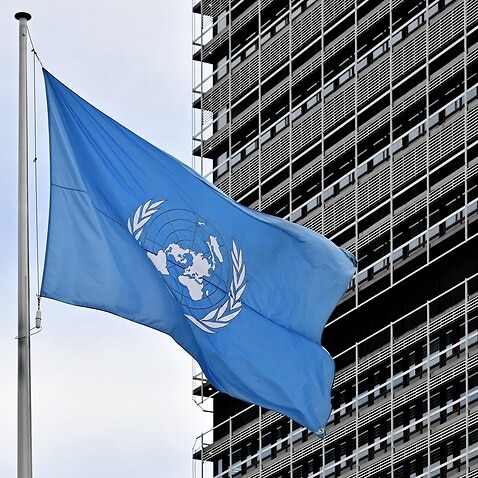 A UN flag waves in front of the United Nations (UN) building in Bonn, Germany