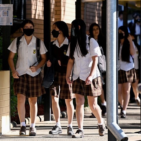 Students wear face masks to school (AAP)