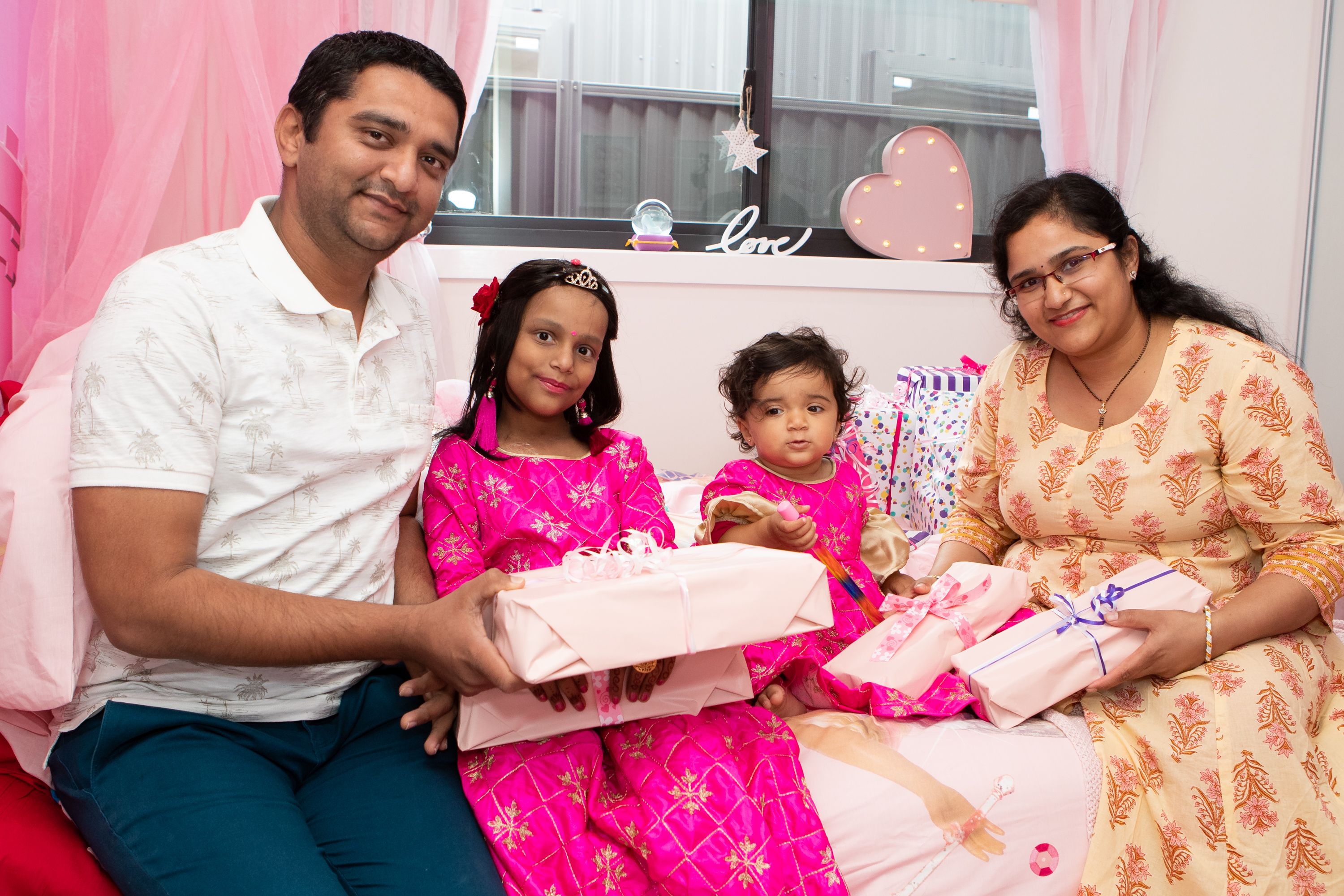 Vishwa with her parents and younger sister