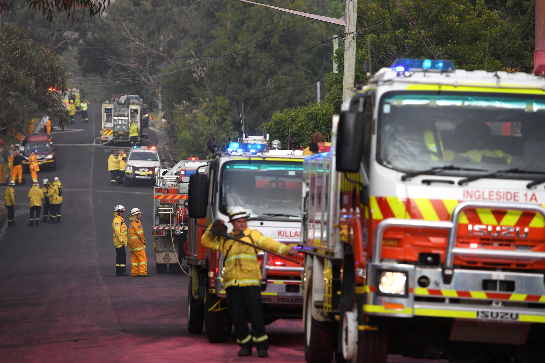 Fire crews protect properties in South Turramurra in Sydney's northern suburbs 