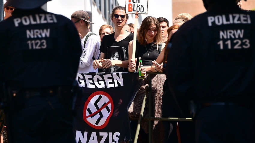 Anti-Nazi protesters and police are seen in Halle, Germany.