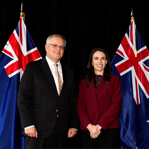 New Zealand Prime Minister Jacinda Ardern (R) poses for a photo with Australian Prime Minister Scott Morrison.