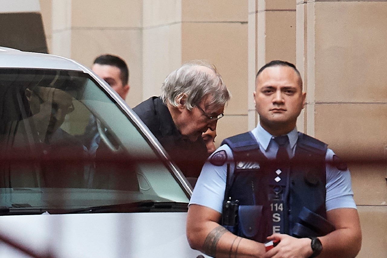 Cardinal George Pell arrives at the Supreme Court of Appeal.