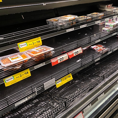 Empty shelves of meat products are seen at a supermarket in Sydney, Friday, January 7, 2022. The recent spike in Covid19 infections has caused major logistical disruptions, with staff members, truck drivers and distribution centre workers among those forc