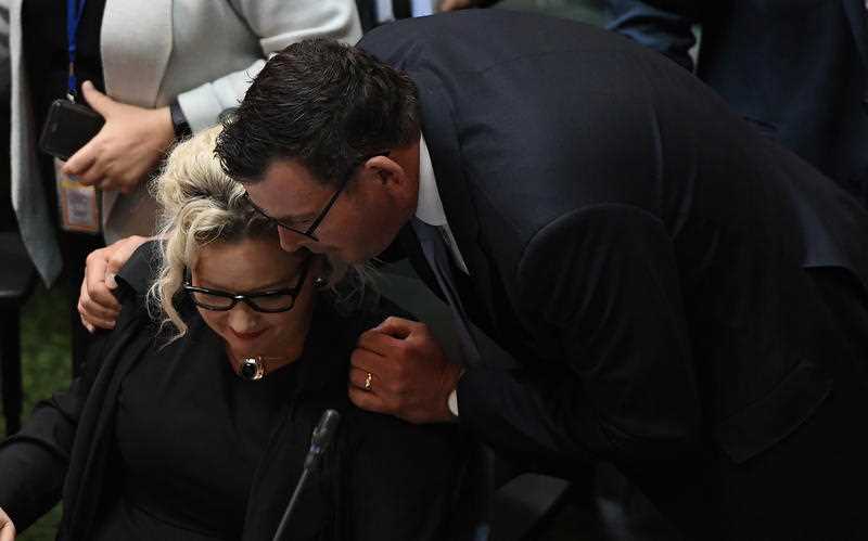 Victorian Premier Daniel Andrews (right) embraces then-health minister Jill Hennessy after the assisted dying bill passed into law in October 2017