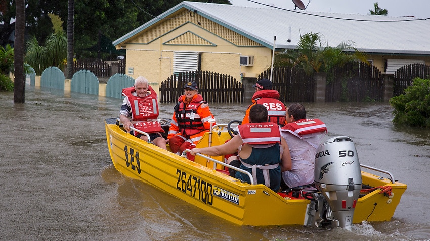 Queensland floods: Foreign tourists rescued amid warning of worst yet ...